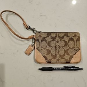 Coach small wristlet beige classic never been used